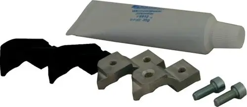 Halterungsset für Sensoren, bestehend aus zwei schwarzen Gummiteilen, einer Metallbasis, Schrauben und einer Tube mit Klebstoff, hergestellt von Wolf.